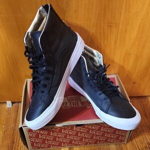 Vans Black and White High-Top Sneakers